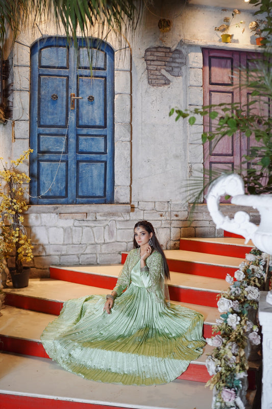 Embrace the enchantment in Pista Majestic Long Tail Cape with flarry maxi