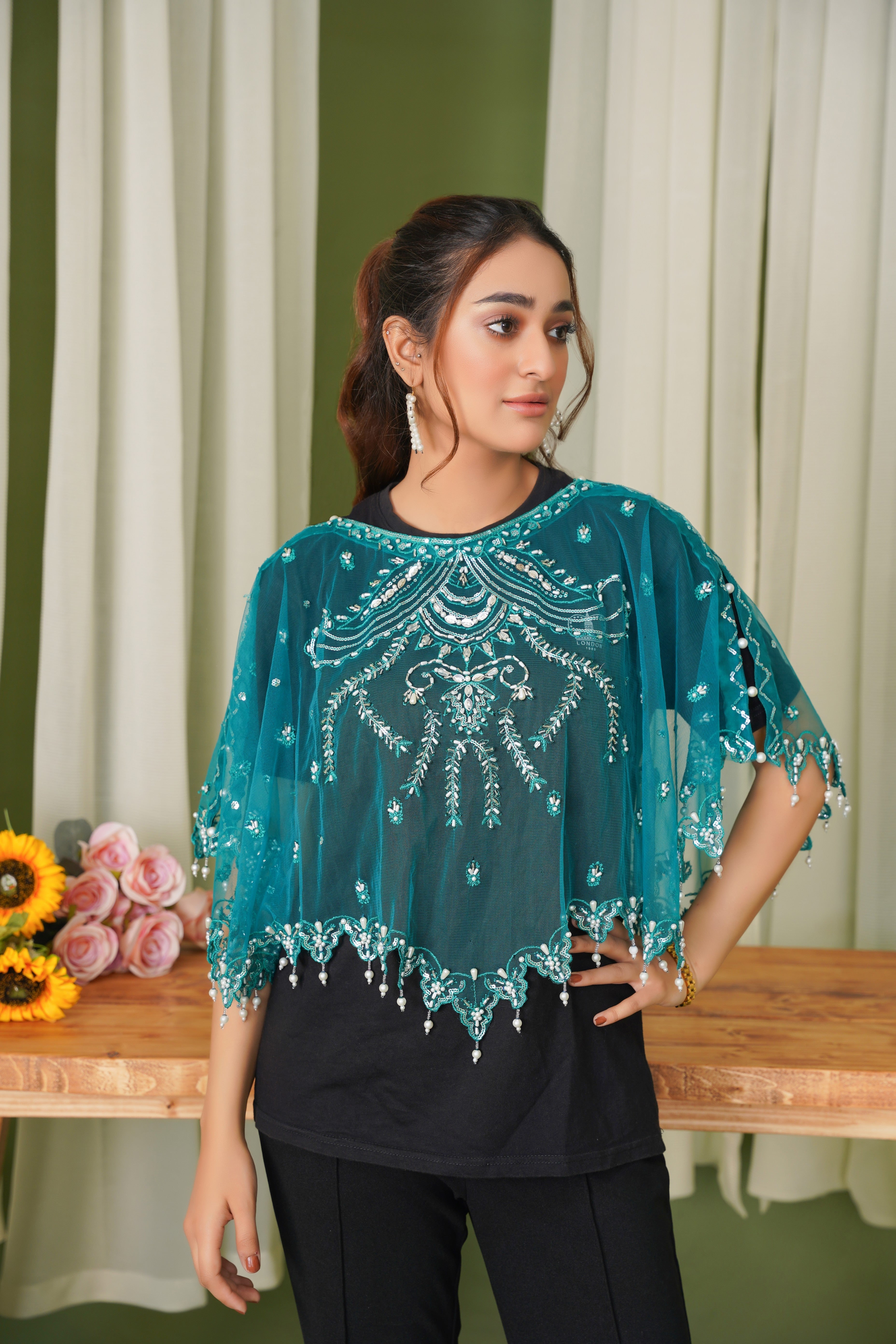 Drape Yourself in Bold Elegance with the Green Viora Luxe Majestic Cape